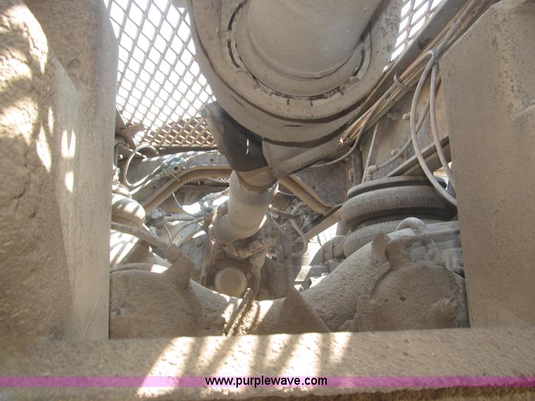 image for item F7088 1997 Ford LT9513 Louisville 113 triple axle semi truck