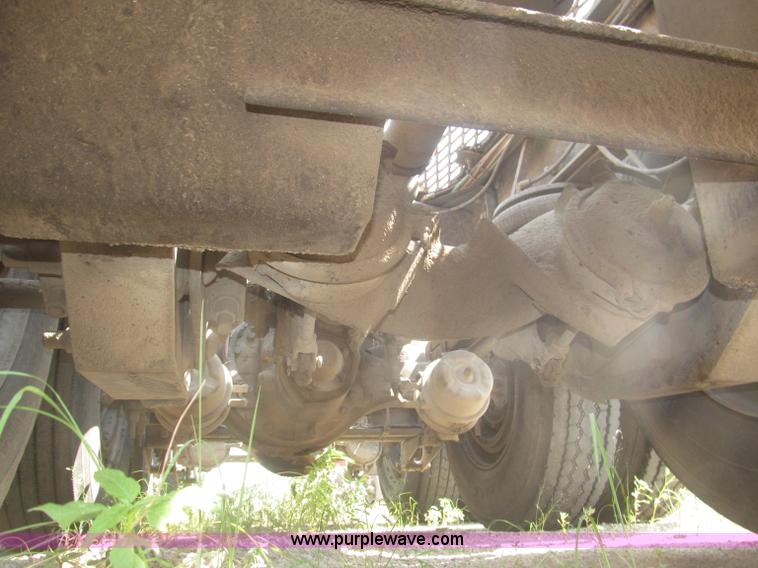 image for item F7088 1997 Ford LT9513 Louisville 113 triple axle semi truck