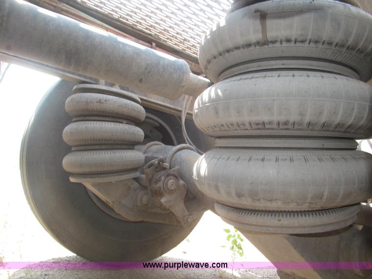 image for item F7088 1997 Ford LT9513 Louisville 113 triple axle semi truck