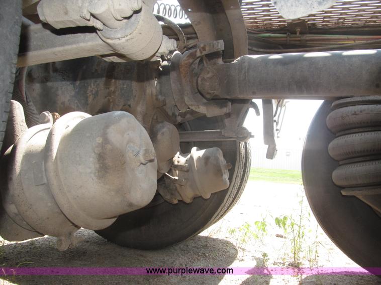 image for item F7088 1997 Ford LT9513 Louisville 113 triple axle semi truck