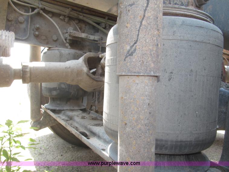 image for item F7088 1997 Ford LT9513 Louisville 113 triple axle semi truck