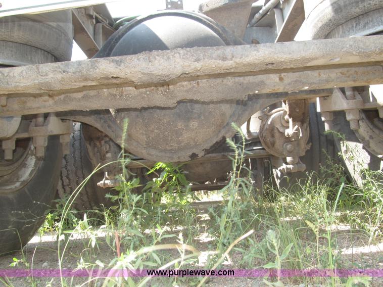 image for item F7088 1997 Ford LT9513 Louisville 113 triple axle semi truck