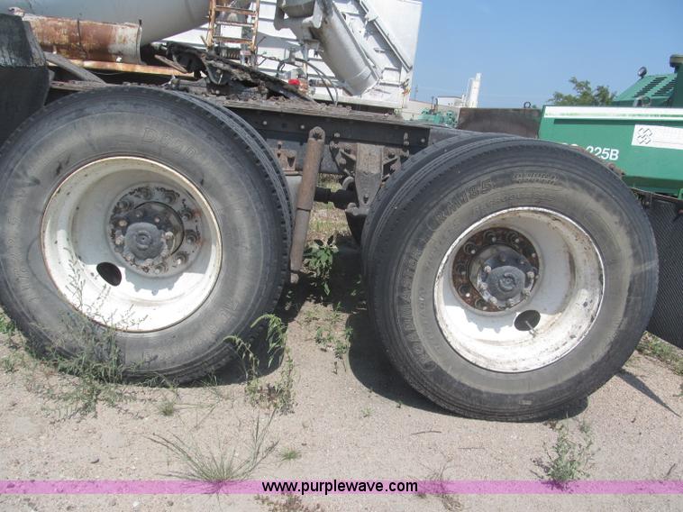 image for item F7088 1997 Ford LT9513 Louisville 113 triple axle semi truck