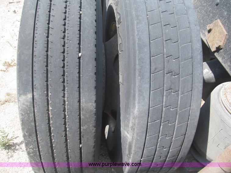 image for item F7088 1997 Ford LT9513 Louisville 113 triple axle semi truck