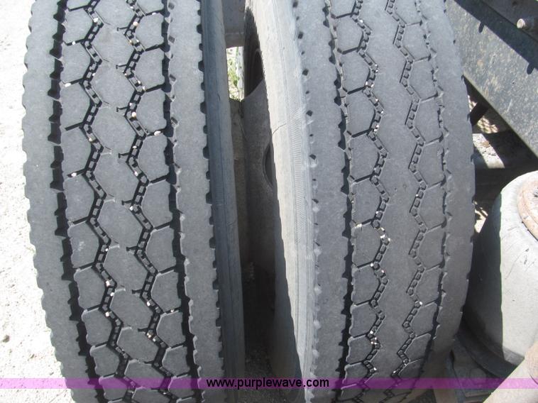 image for item F7088 1997 Ford LT9513 Louisville 113 triple axle semi truck