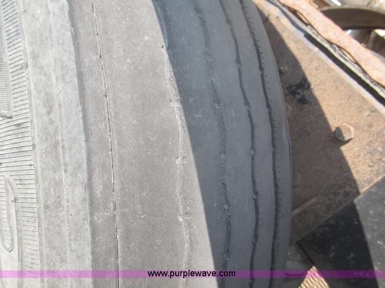 image for item F7088 1997 Ford LT9513 Louisville 113 triple axle semi truck