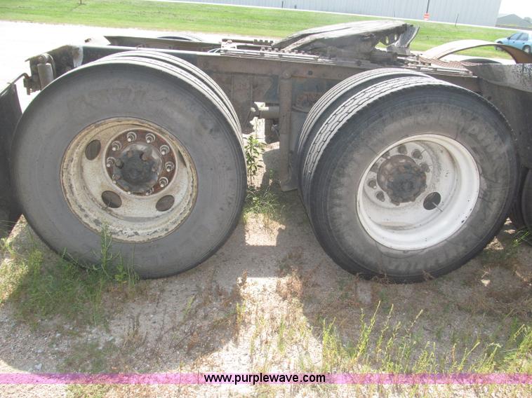 image for item F7088 1997 Ford LT9513 Louisville 113 triple axle semi truck