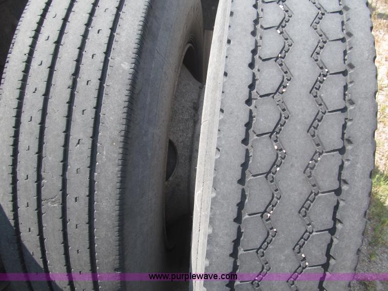 image for item F7088 1997 Ford LT9513 Louisville 113 triple axle semi truck