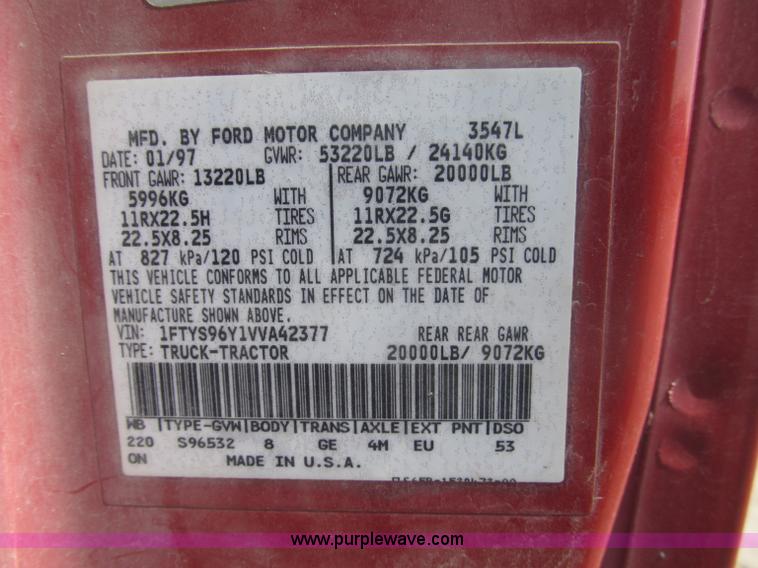 image for item F7088 1997 Ford LT9513 Louisville 113 triple axle semi truck