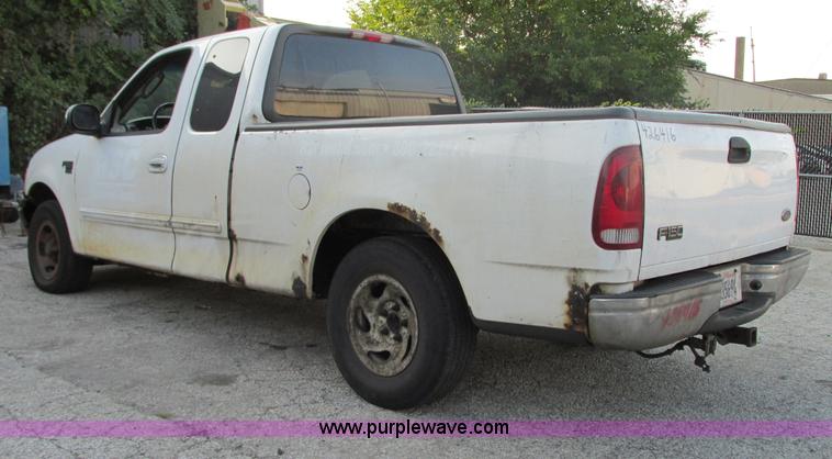 image for item G9228 2002 Ford F150 XLT SuperCab pickup truck