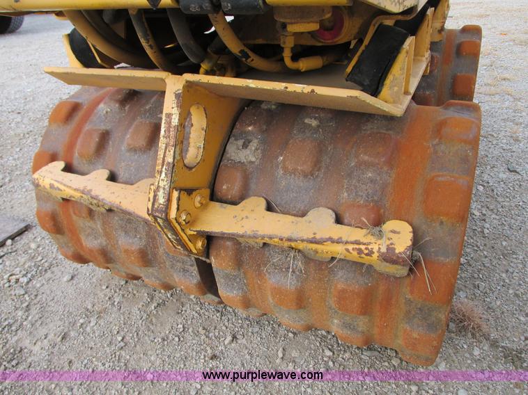 image for item G9246 2005 Multiquip Rammax P33/24HHMR walk-behind vibratory trench compactor