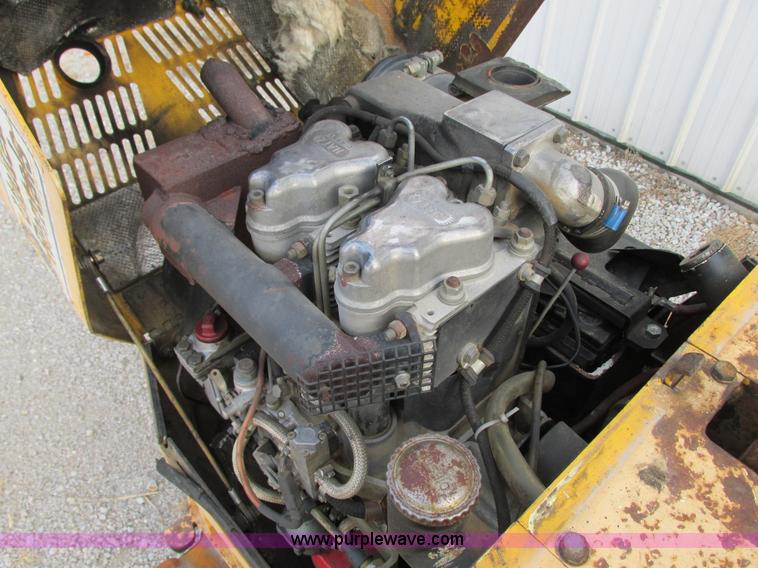 image for item G9246 2005 Multiquip Rammax P33/24HHMR walk-behind vibratory trench compactor