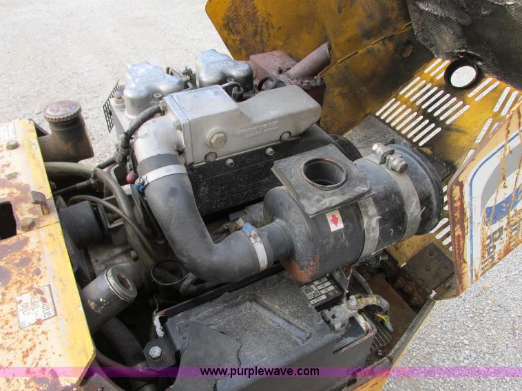 image for item G9246 2005 Multiquip Rammax P33/24HHMR walk-behind vibratory trench compactor