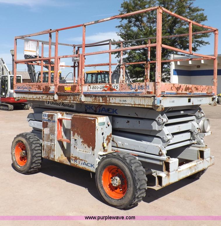 image for item I7590 2005 Skyjack SJ8831RT scissor lift