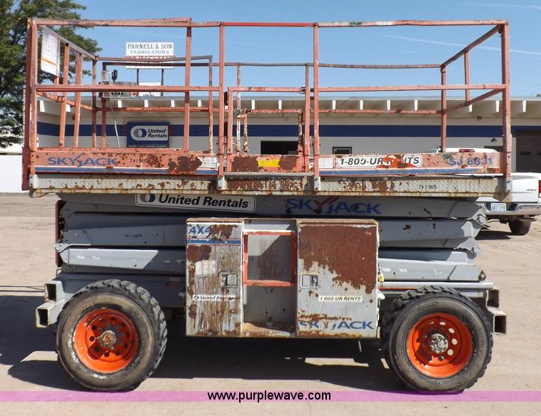 image for item I7590 2005 Skyjack SJ8831RT scissor lift