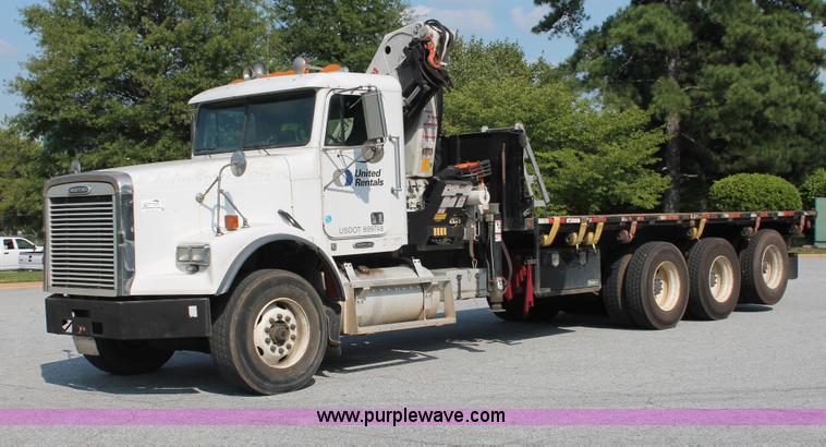 image for item I7757 2002 Freightliner FLD120SD triple axle semi truck with Palfinger knuckle boom crane