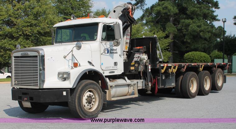 image for item I7757 2002 Freightliner FLD120SD triple axle semi truck with Palfinger knuckle boom crane