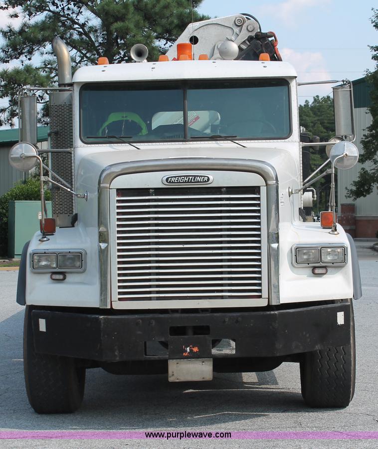 image for item I7757 2002 Freightliner FLD120SD triple axle semi truck with Palfinger knuckle boom crane