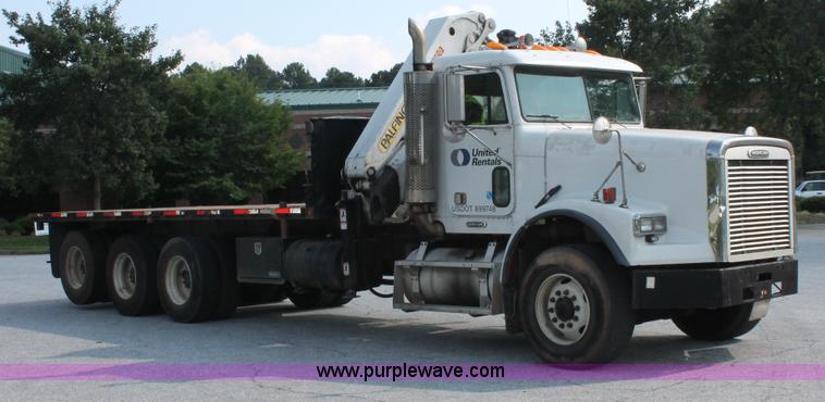 image for item I7757 2002 Freightliner FLD120SD triple axle semi truck with Palfinger knuckle boom crane