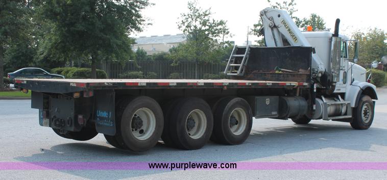 image for item I7757 2002 Freightliner FLD120SD triple axle semi truck with Palfinger knuckle boom crane