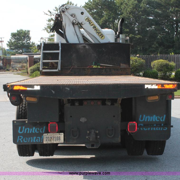 image for item I7757 2002 Freightliner FLD120SD triple axle semi truck with Palfinger knuckle boom crane