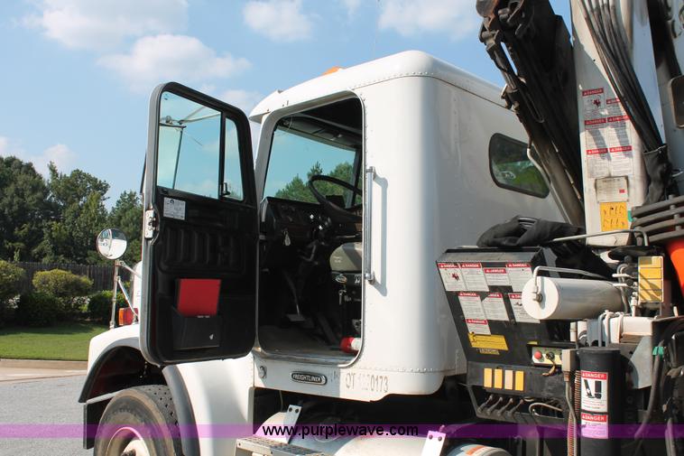 image for item I7757 2002 Freightliner FLD120SD triple axle semi truck with Palfinger knuckle boom crane