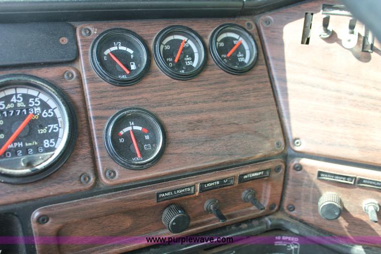 image for item I7757 2002 Freightliner FLD120SD triple axle semi truck with Palfinger knuckle boom crane