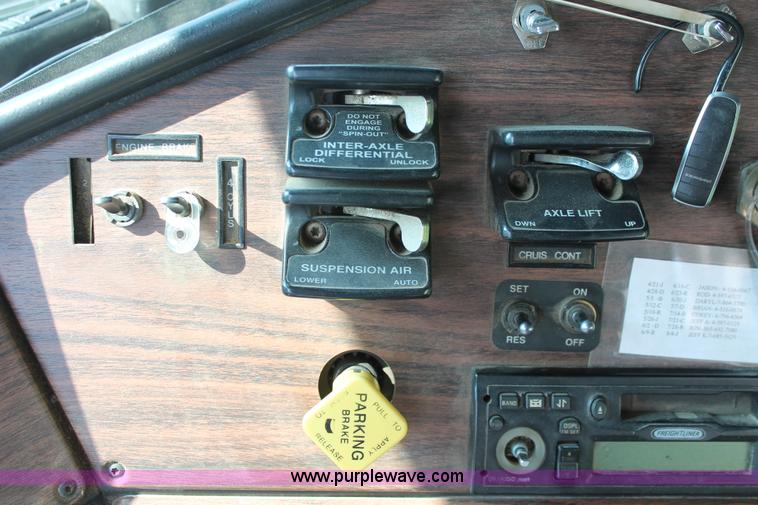 image for item I7757 2002 Freightliner FLD120SD triple axle semi truck with Palfinger knuckle boom crane