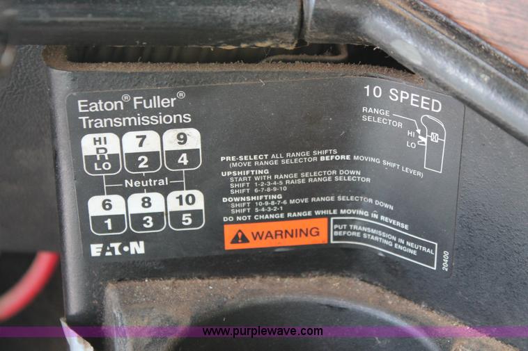 image for item I7757 2002 Freightliner FLD120SD triple axle semi truck with Palfinger knuckle boom crane