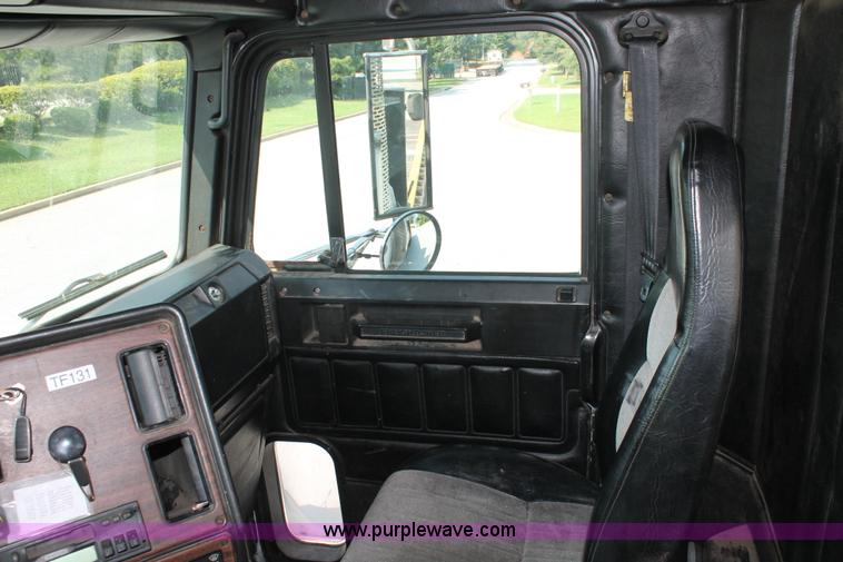 image for item I7757 2002 Freightliner FLD120SD triple axle semi truck with Palfinger knuckle boom crane