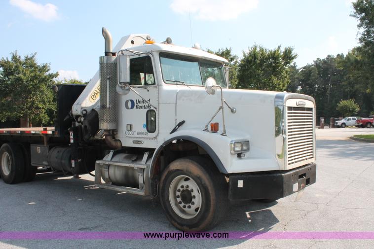 image for item I7757 2002 Freightliner FLD120SD triple axle semi truck with Palfinger knuckle boom crane