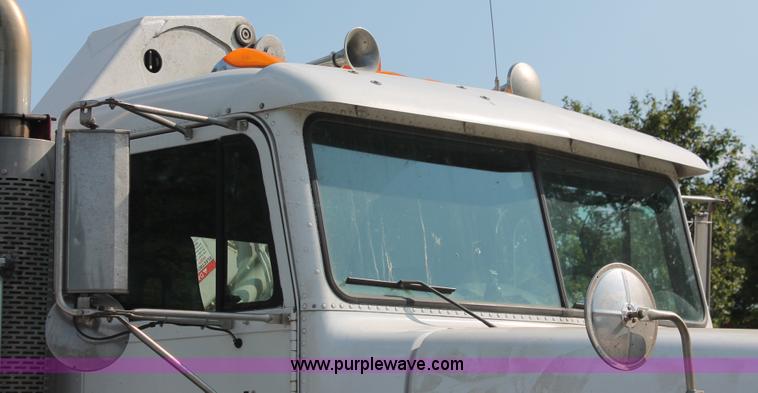 image for item I7757 2002 Freightliner FLD120SD triple axle semi truck with Palfinger knuckle boom crane