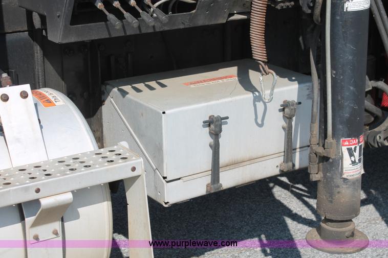 image for item I7757 2002 Freightliner FLD120SD triple axle semi truck with Palfinger knuckle boom crane