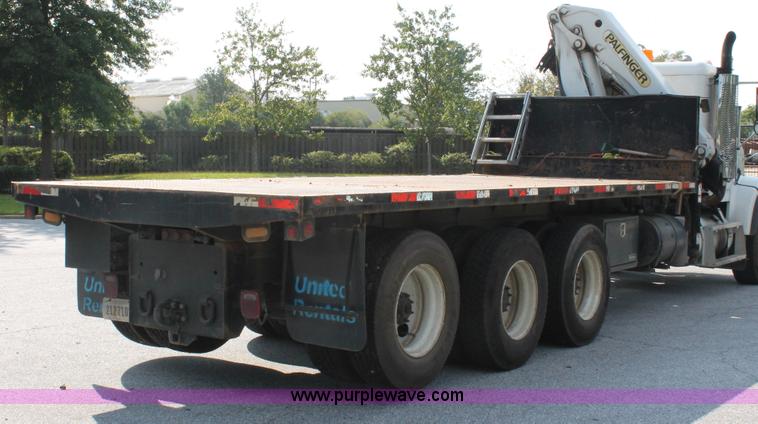 image for item I7757 2002 Freightliner FLD120SD triple axle semi truck with Palfinger knuckle boom crane