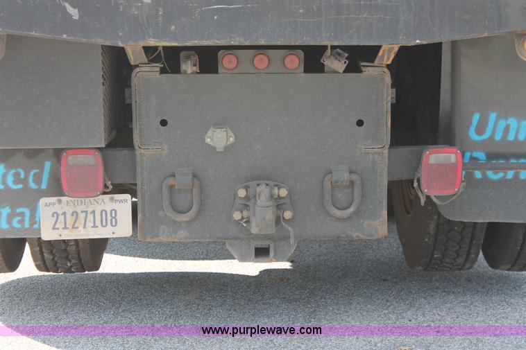 image for item I7757 2002 Freightliner FLD120SD triple axle semi truck with Palfinger knuckle boom crane