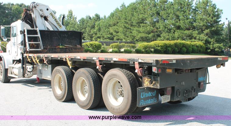 image for item I7757 2002 Freightliner FLD120SD triple axle semi truck with Palfinger knuckle boom crane