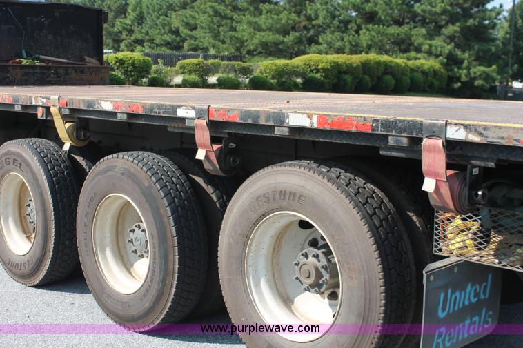 image for item I7757 2002 Freightliner FLD120SD triple axle semi truck with Palfinger knuckle boom crane