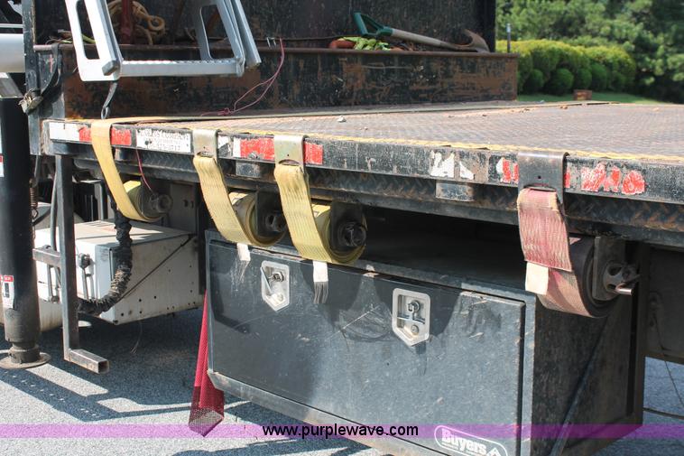 image for item I7757 2002 Freightliner FLD120SD triple axle semi truck with Palfinger knuckle boom crane