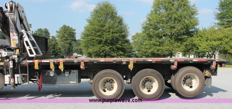 image for item I7757 2002 Freightliner FLD120SD triple axle semi truck with Palfinger knuckle boom crane