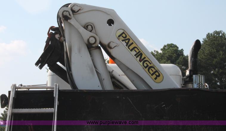 image for item I7757 2002 Freightliner FLD120SD triple axle semi truck with Palfinger knuckle boom crane