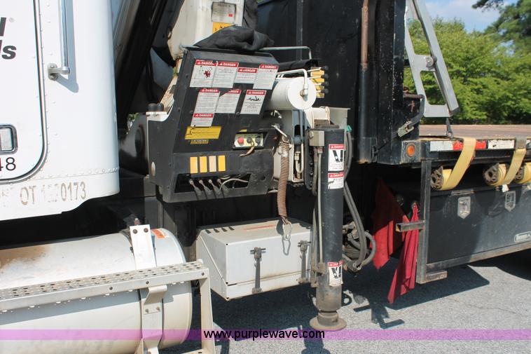 image for item I7757 2002 Freightliner FLD120SD triple axle semi truck with Palfinger knuckle boom crane