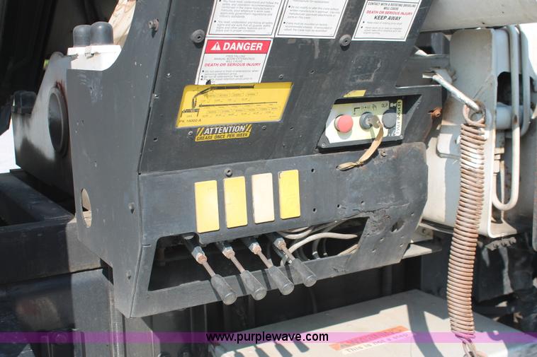 image for item I7757 2002 Freightliner FLD120SD triple axle semi truck with Palfinger knuckle boom crane