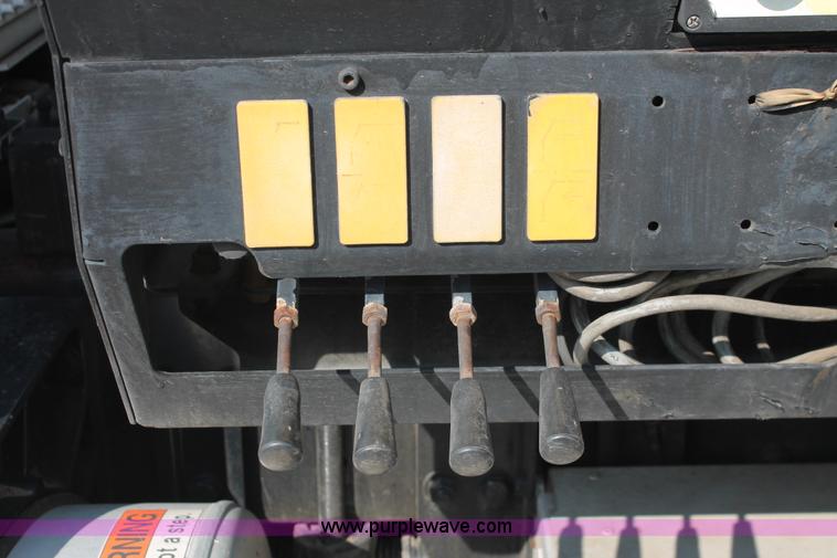 image for item I7757 2002 Freightliner FLD120SD triple axle semi truck with Palfinger knuckle boom crane