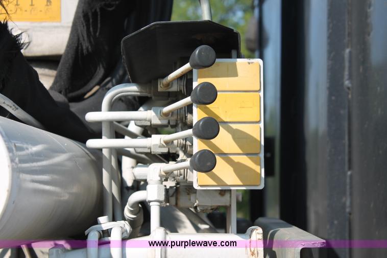 image for item I7757 2002 Freightliner FLD120SD triple axle semi truck with Palfinger knuckle boom crane