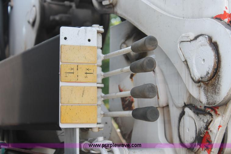 image for item I7757 2002 Freightliner FLD120SD triple axle semi truck with Palfinger knuckle boom crane