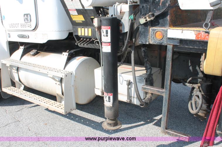 image for item I7757 2002 Freightliner FLD120SD triple axle semi truck with Palfinger knuckle boom crane