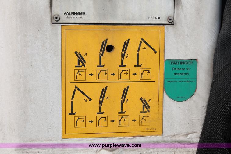 image for item I7757 2002 Freightliner FLD120SD triple axle semi truck with Palfinger knuckle boom crane