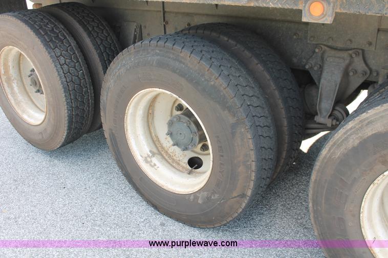 image for item I7757 2002 Freightliner FLD120SD triple axle semi truck with Palfinger knuckle boom crane