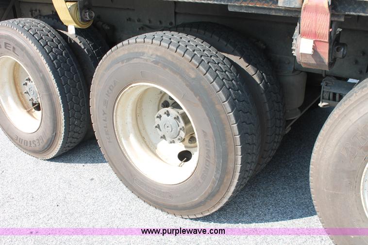 image for item I7757 2002 Freightliner FLD120SD triple axle semi truck with Palfinger knuckle boom crane