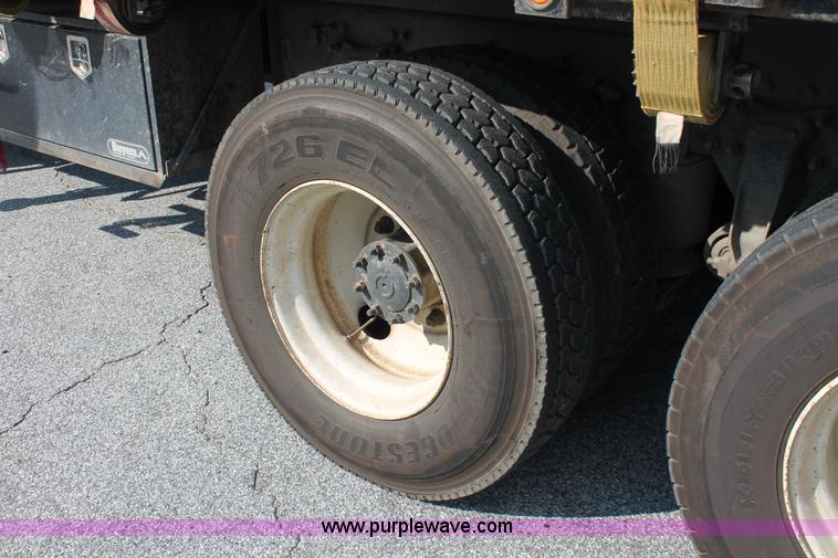 image for item I7757 2002 Freightliner FLD120SD triple axle semi truck with Palfinger knuckle boom crane